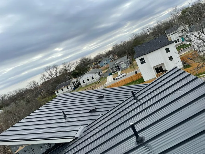 Standing seam metal roof panels with vents for Skylight Repair in Dacula